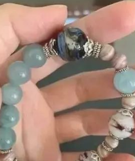 将14岁家狗骨灰烧制硫璃，她见圆珠上浑然一体的黑与白狗脸，红了眼圈…